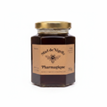 Pot de Miel de Nigelle d'Égypte Pharmagique 250g sur fond blanc